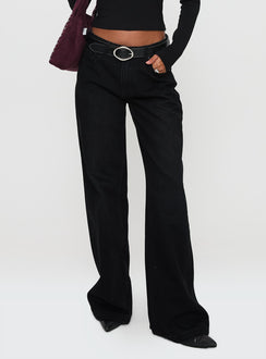side view of model wearing Princess Polly Everlong Mid Rise Straight Leg Jeans Mid Black Wash High Rise Jeans Jeans 