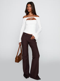 front view of model wearing Princess Polly Kinkirk Flared Pants Brown Pinstripe Low Rise Pants Pants 