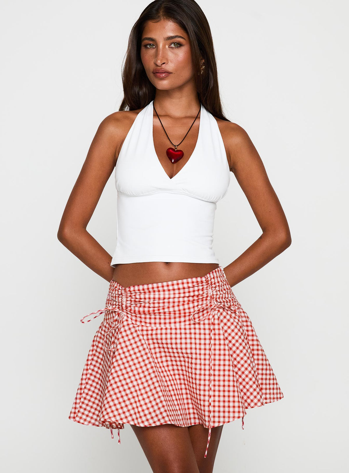   front view of model wearing Princess Polly Sweet Verona Ruched Mini Skirt Red Check Mini Skirts Skirts 