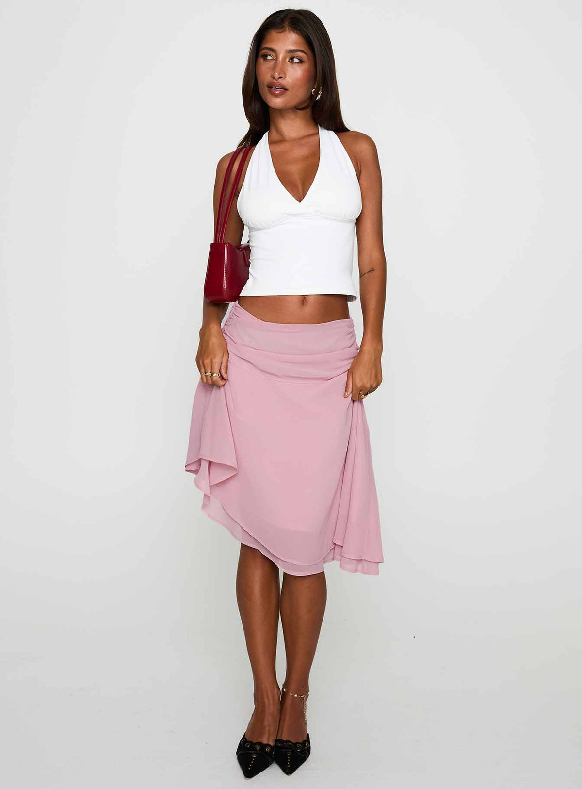   front view of model wearing Princess Polly Evanescence Asymmetrical Midi Skirt Pastel Pink Midi Skirts 