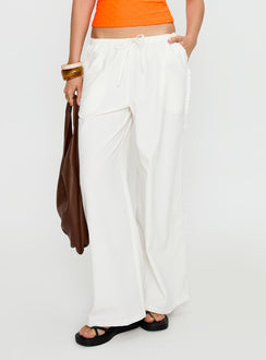 side view of model wearing Princess Polly Destinee Frill Pant White Low Rise Pants Pants 