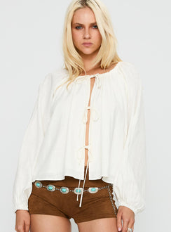 front view of model wearing Princess Polly Somebody Else Tie Up Top White Full Sleeves Crew Neck 