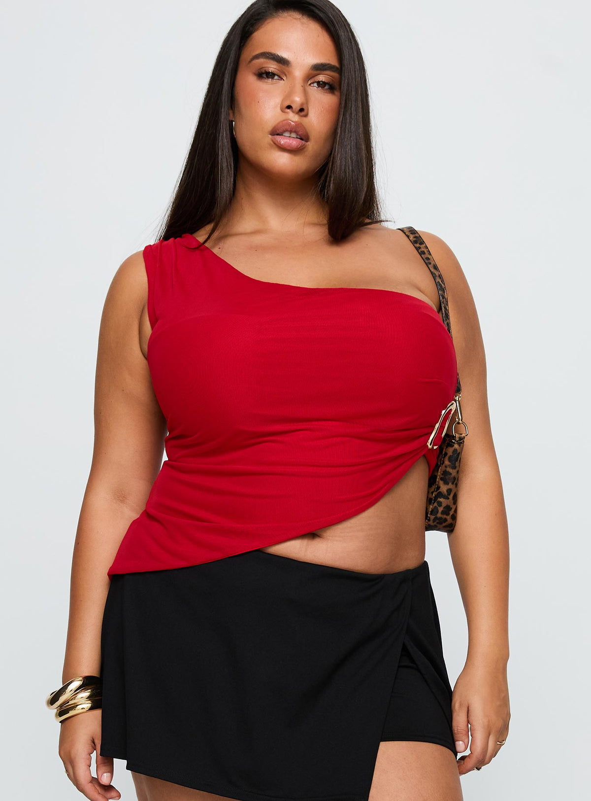 front view of model wearing Princess Polly Machiatto One Shoulder Top Red Curve Sleeveless Asymmetric Neckline 