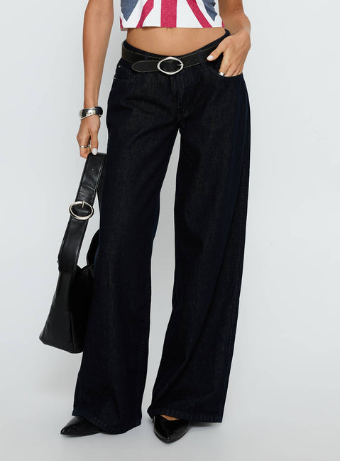 side view of model wearing Princess Polly Ramos Low Rise Wide Leg Jeans Raw Indigo Blue Low Rise Jeans Jeans 