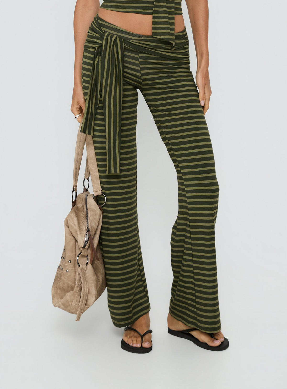 back view of model wearing Princess Polly Esata Tie Detail Pants Green Stripe Mid Rise Pants Pants 