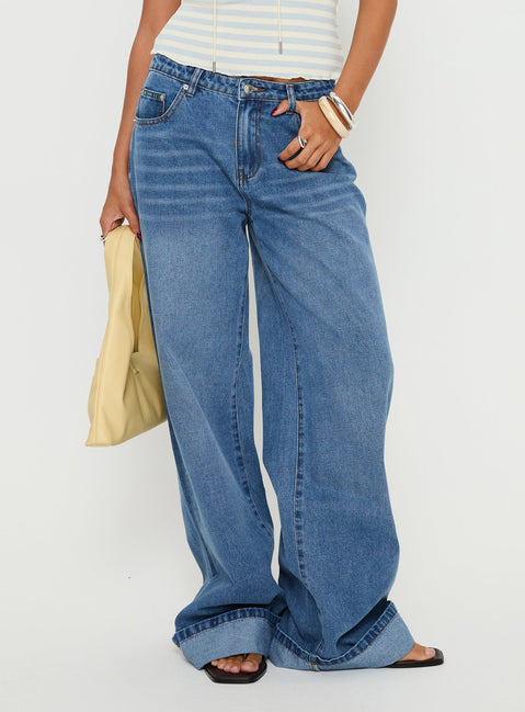 side view of model wearing Princess Polly Jacobie Mid Rise Wide Leg Jeans Mid Blue Wash Mid Rise Jeans Jeans 
