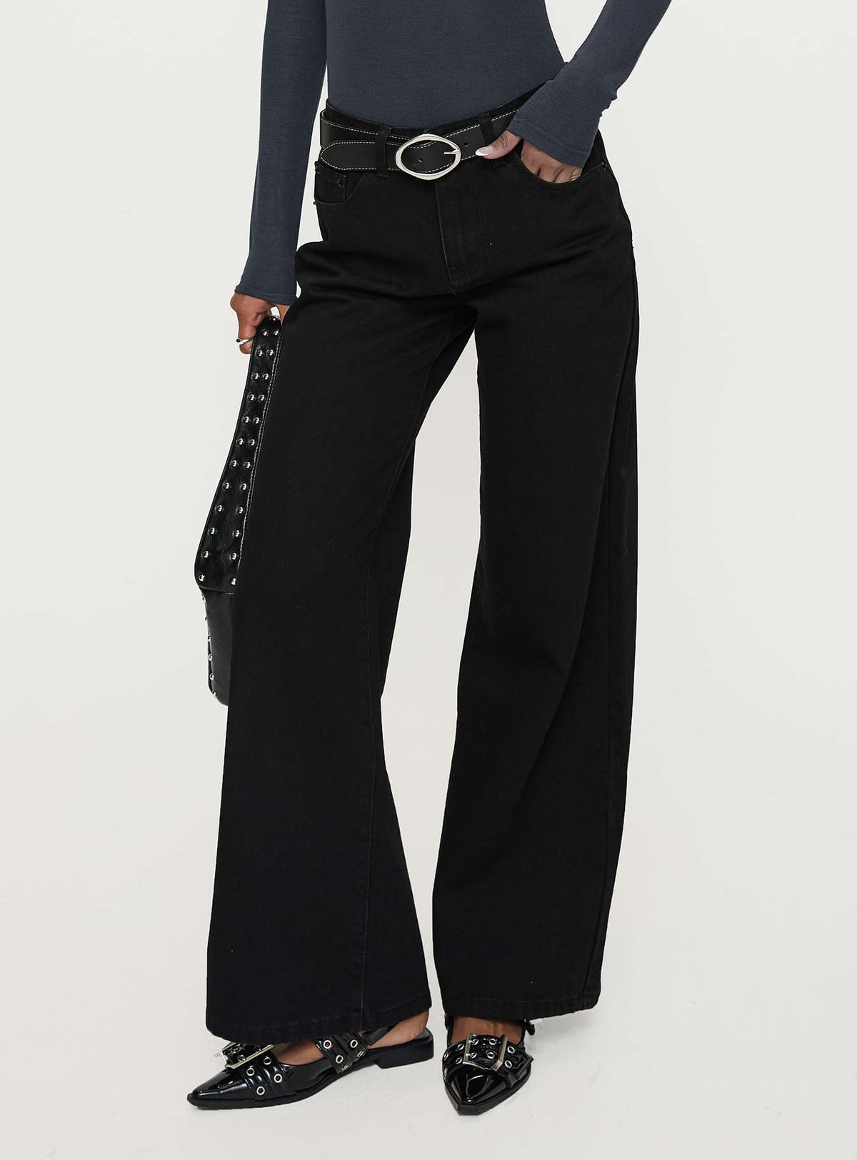 front view of model wearing Princess Polly Colemane Mid Rise Wide Leg Jeans Black High Rise Jeans Jeans 