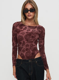 front view of model wearing Princess Polly Spruce Bodysuit Red Paisley Long Sleeve Tops Bodysuit 