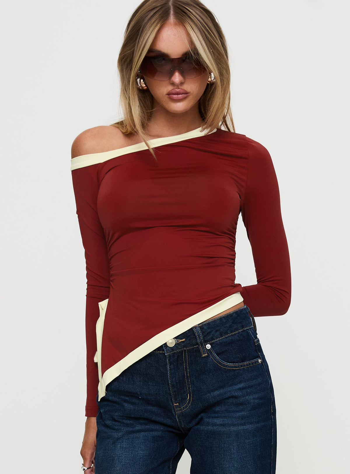 front view of model wearing Princess Polly Fake Smile Long Sleeve Top Burgundy / Cream Full Sleeves Asymmetric Neckline 