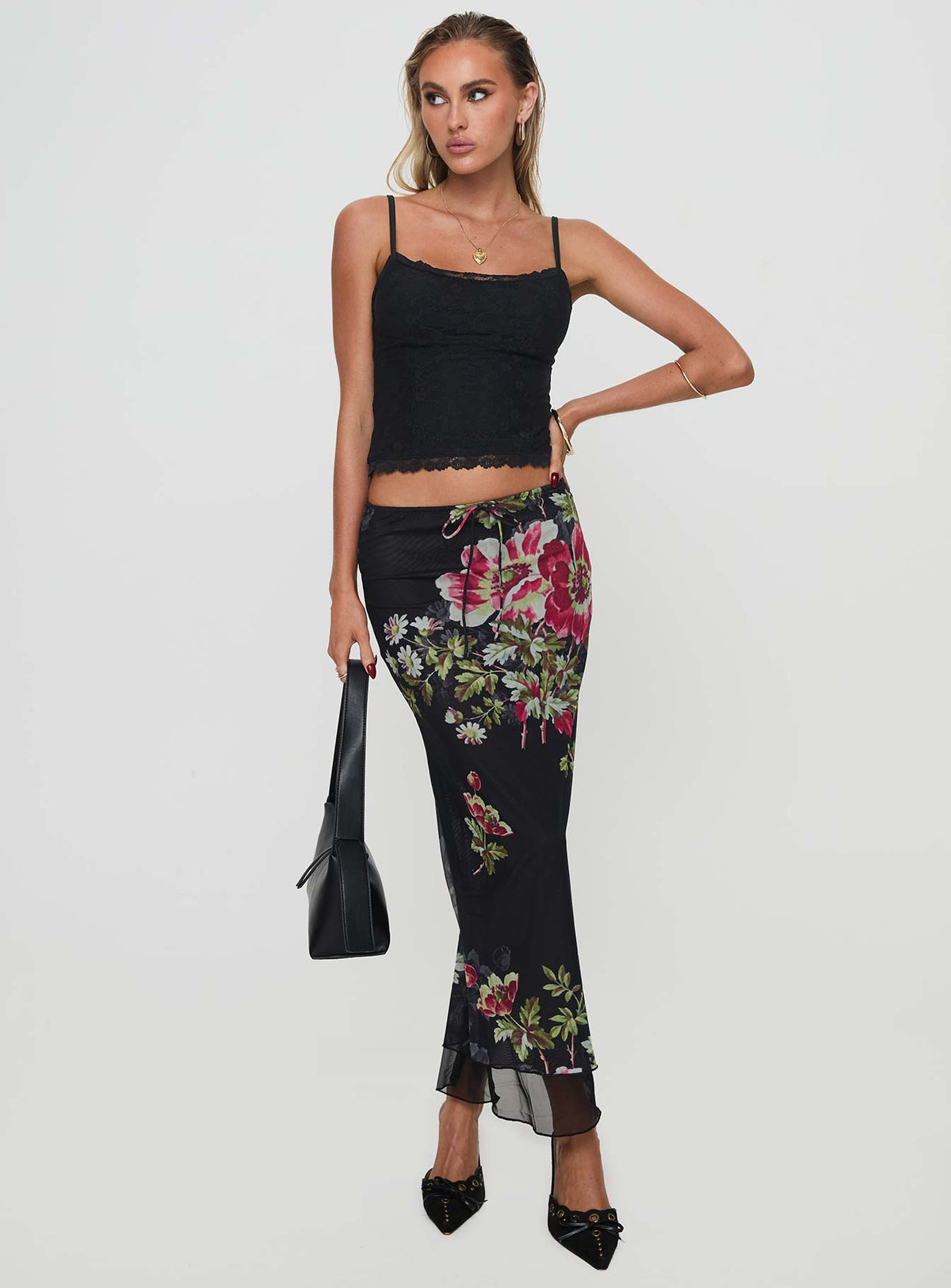   front view of model wearing Princess Polly Paganio Maxi Skirt Black Floral Maxi Skirts Skirts 