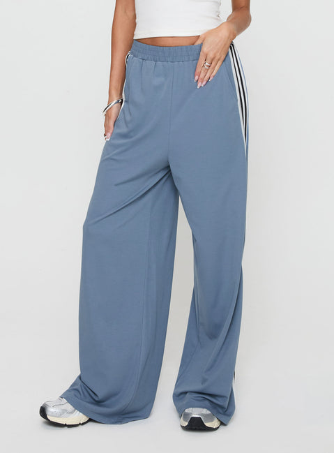 back view of model wearing Princess Polly Dime Track Pants Blue High Rise Pants Pants 