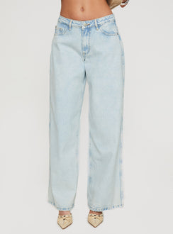 side view of model wearing Princess Polly Brayden Low Rise Relaxed Jeans Light Acid Wash Low Rise Jeans Jeans 