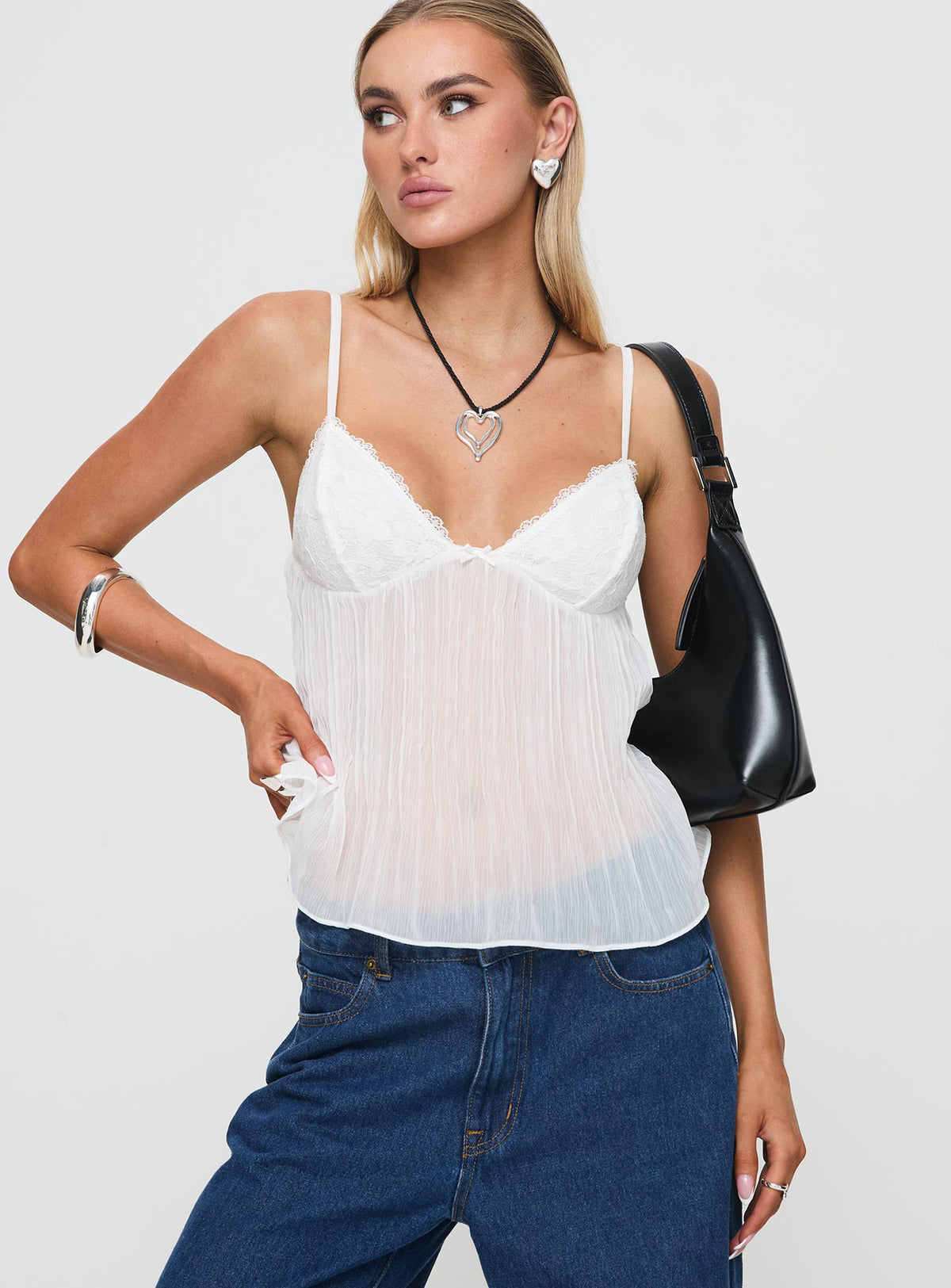 front view of model wearing Princess Polly Zami Pleat Top White Sleeveless Sweetheart 