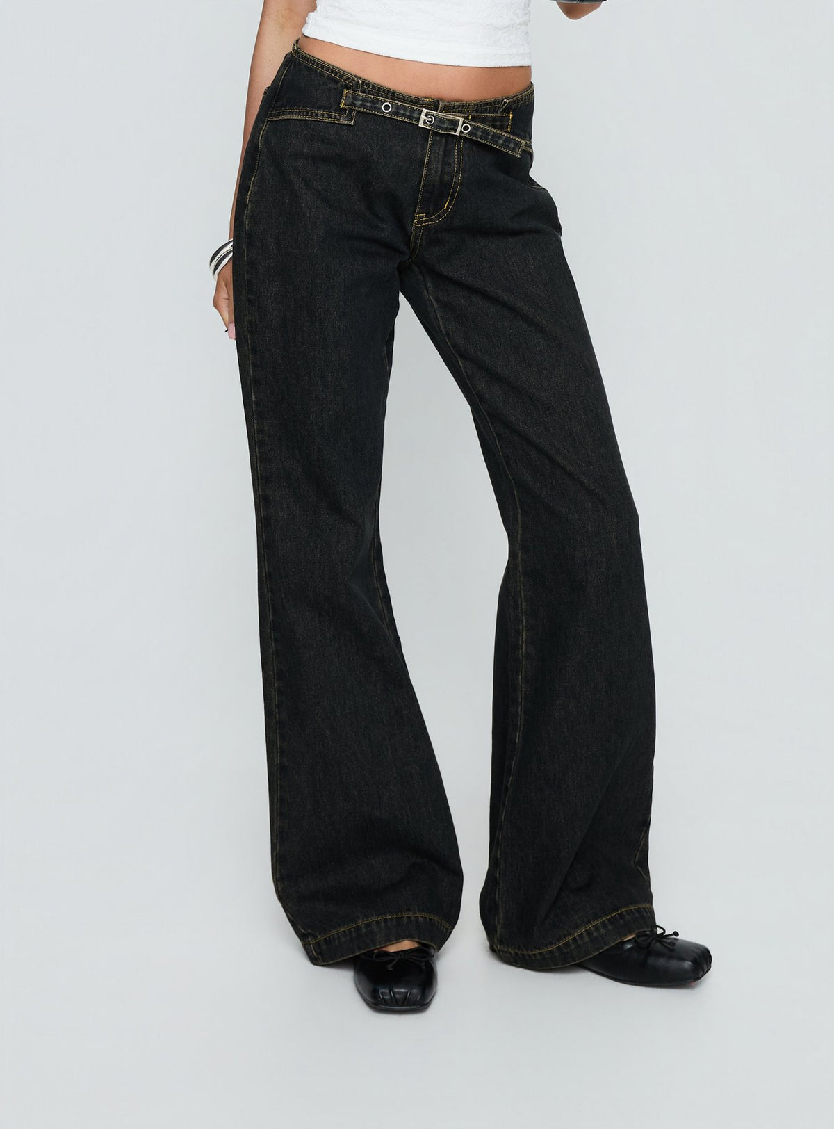 back view of model wearing Princess Polly Slow Ride Mid Rise Bootleg Belted Jeans Grunge Wash Mid Rise Jeans Jeans 