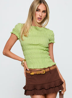 front view of model wearing Princess Polly Romelle Shirred Top Lime Short Sleeves High Neck 