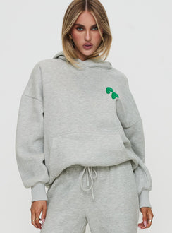 front view of model wearing Princess Polly Princess Polly Hooded Sweatshirt Bubble Text Grey Marle / Green Jumpers 