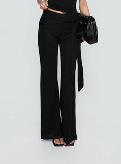 side view of model wearing Princess Polly Katiana Wrap Jersey Pants Black Mid Rise Pants Pants 