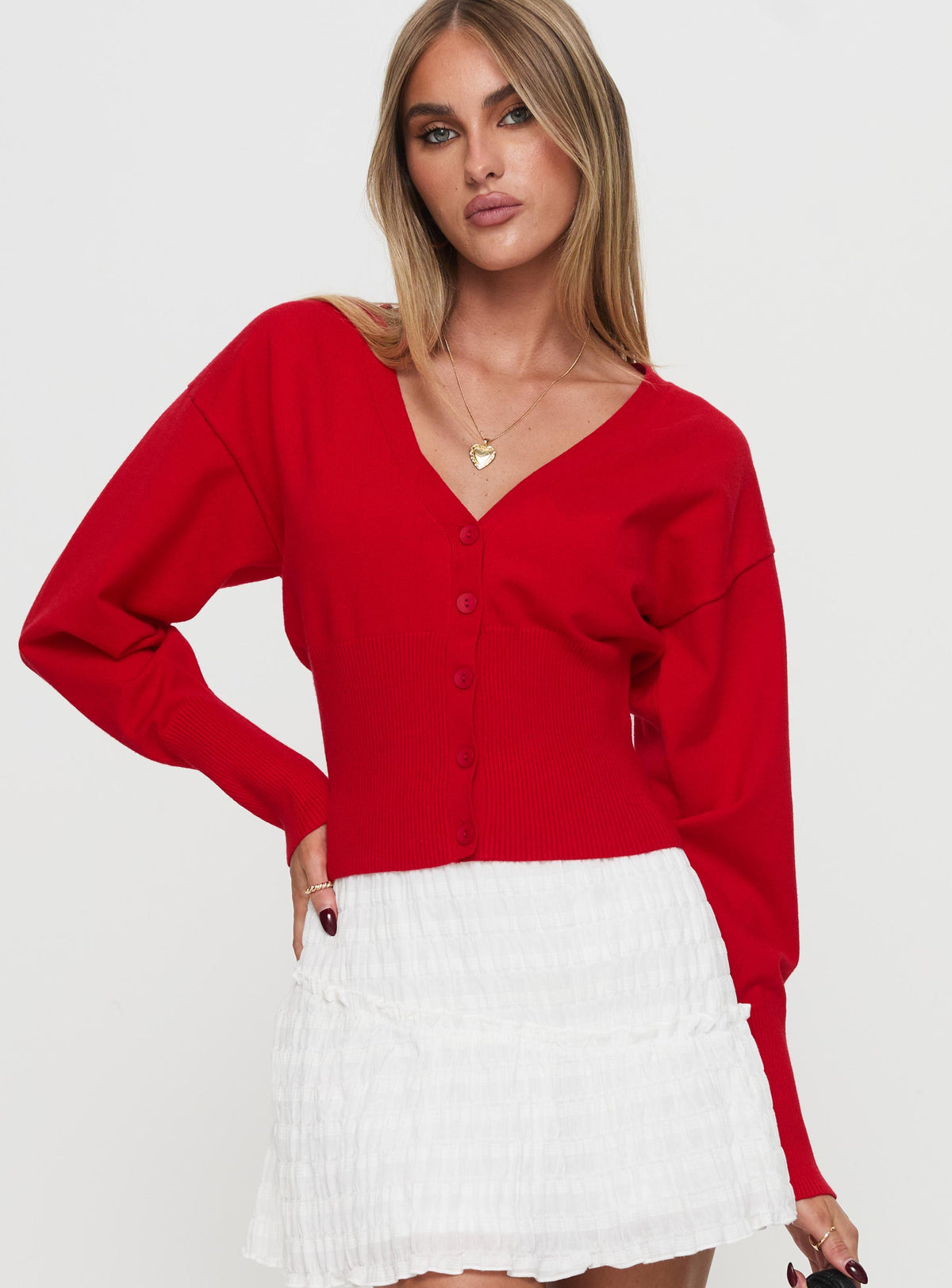 side view of model wearing Princess Polly Wistfully Knit Cardigan Red Jumpers 