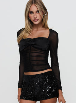 side view of model wearing Princess Polly Nelope Ruched Long Sleeve Top Black Full Sleeves Sweetheart 