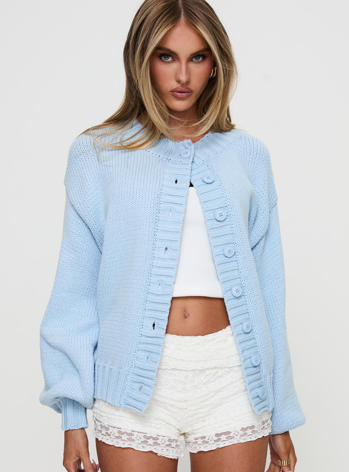 front view of model wearing Princess Polly Edern Cardigan Blue cropped Jumpers 