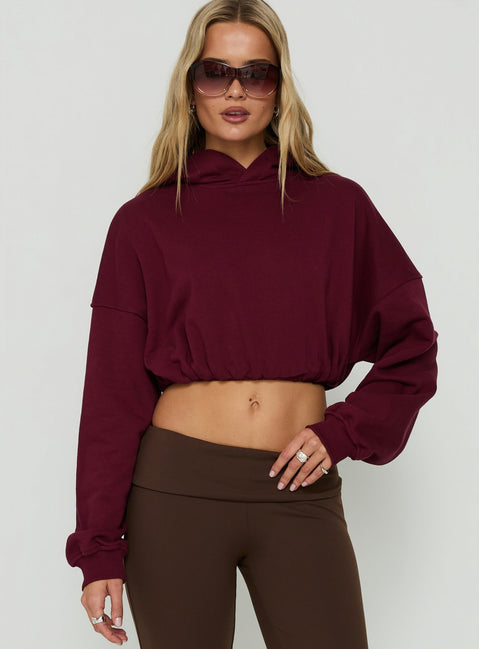 Featuring the Mayse Bubble Hem Cropped Hoodie Cherry womens-jumpers with short length front view of model wearing Princess Polly