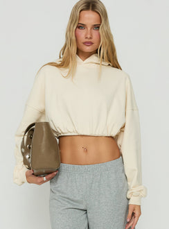 Featuring the Mayse Bubble Hem Cropped Hoodie Cream womens jumpers in short length front view of model wearing Princess Polly