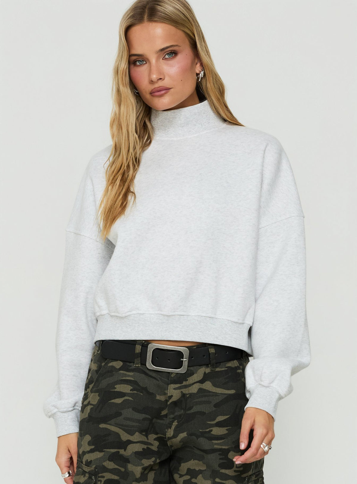Crafted with the Anyya Funnel Neck Crew Jumper Grey Marle womens jumper in short length side view of model wearing Princess Polly