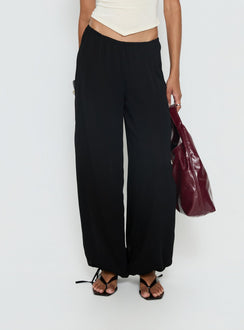 back view of model wearing Princess Polly Moondancer Balloon Pants Black Mid Rise Pants Pants 