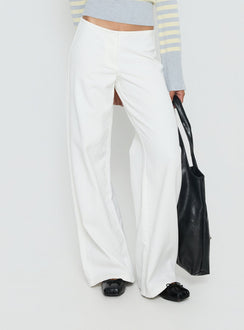 back view of model wearing Princess Polly Hereos Mid Rise Baggy Leg Jeans White Mid Rise Jeans Jeans 