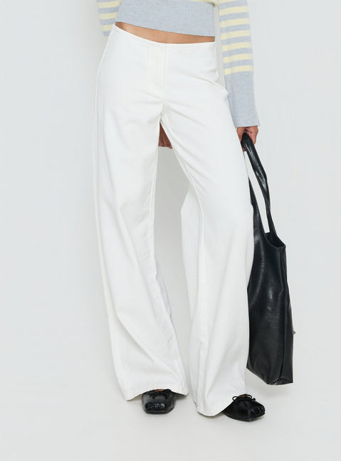 back view of model wearing Princess Polly Hereos Mid Rise Baggy Leg Jeans White Mid Rise Jeans Jeans 