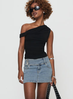   side view of model wearing Princess Polly Brinkman Mini Skirt Light Wash Denim Mini Skirts Skirts 