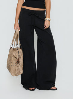 front view of model wearing Princess Polly Dodie Wide Leg Pants Washed Black Mid Rise Pants Pants 