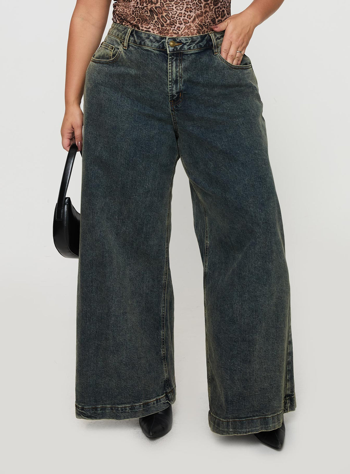 front view of model wearing Princess Polly Ziggie Low Rise Baggy Jeans Antique Wash Curve High Rise Jeans Jeans 