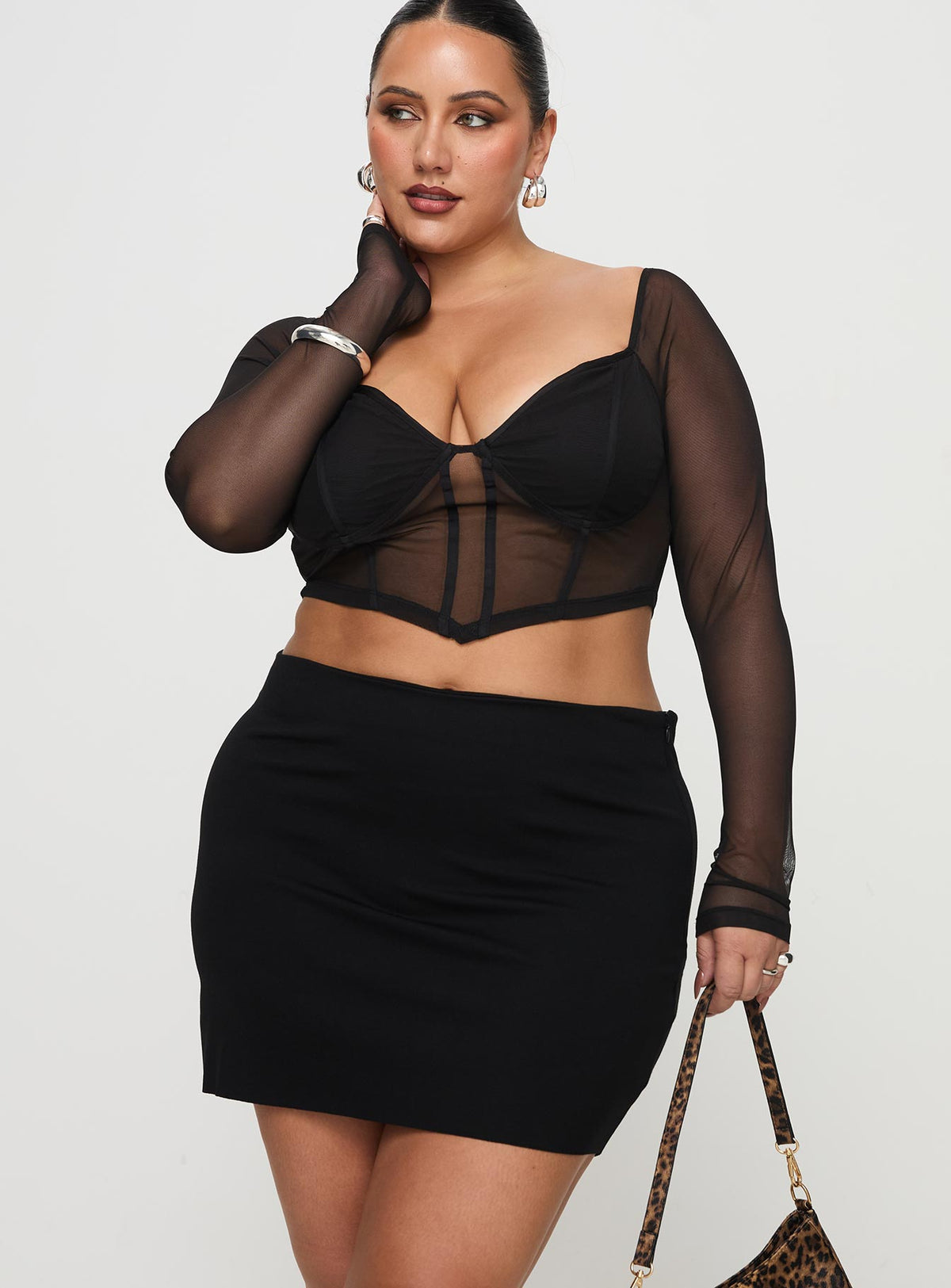   front view of model wearing Princess Polly Karley Low Waist Mini Skirt Black Curve Mini Skirts Skirts 