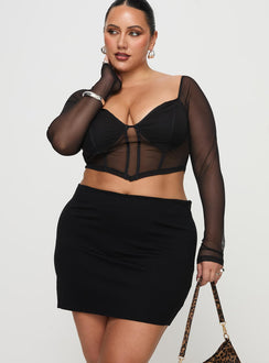   front view of model wearing Princess Polly Karley Low Waist Mini Skirt Black Curve Mini Skirts Skirts 