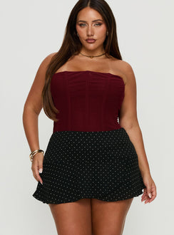   front view of model wearing Princess Polly Sonsie Mini Skirt Black / White Polka Curve Skirts 
