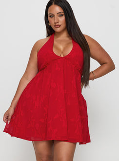side view of model wearing Princess Polly Moriah Halter Mini Dress Red Curve Plunger 