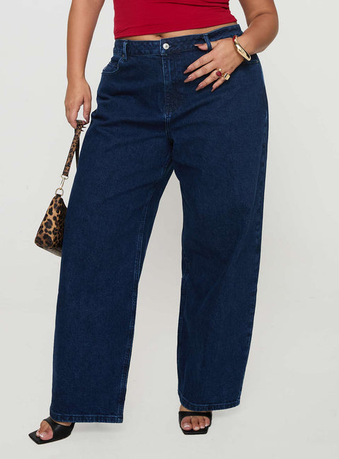 front view of model wearing Princess Polly Britta Mid Rise Tapered Leg Jeans Dark Wash Curve High Rise Jeans Jeans 
