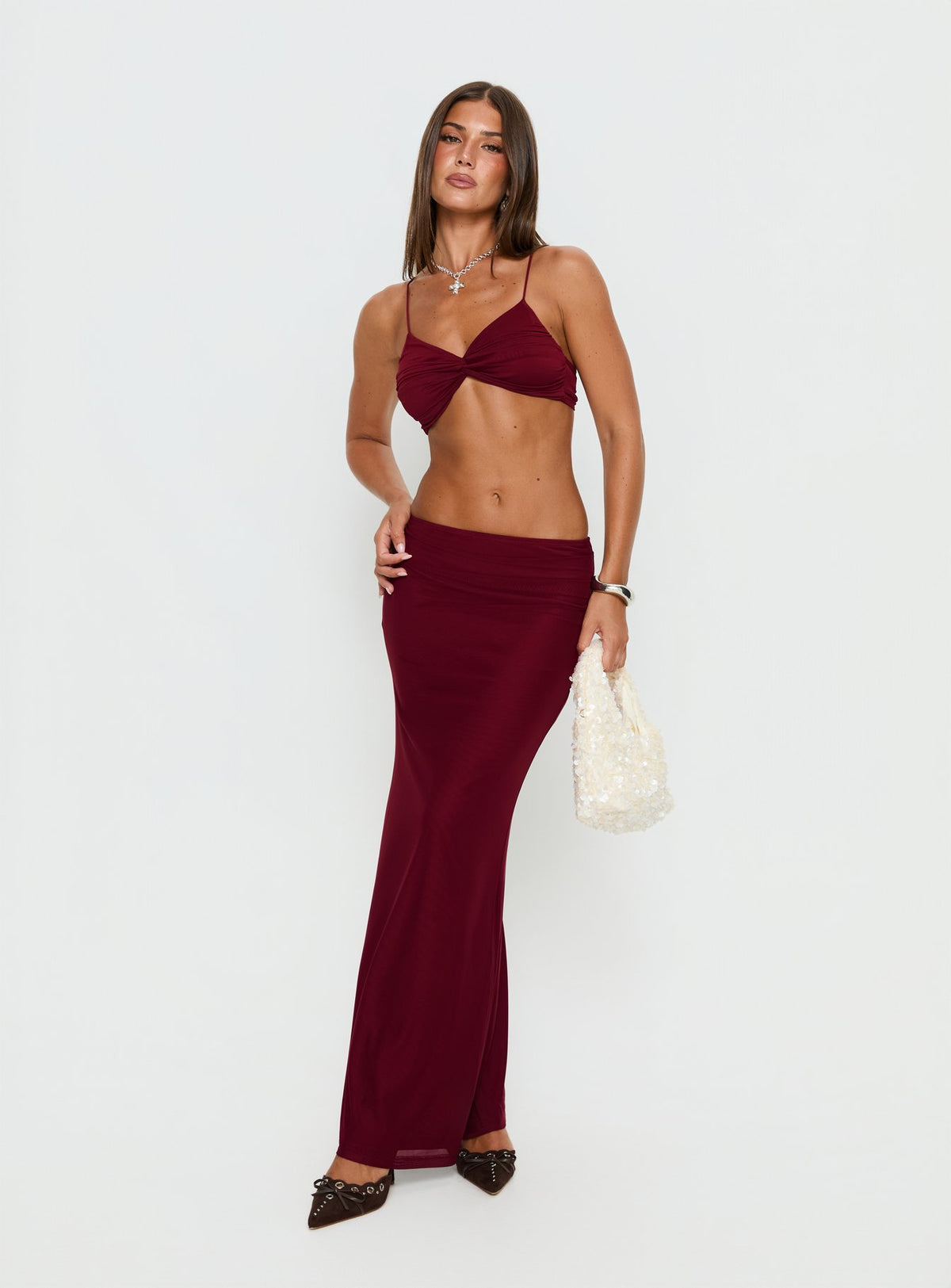   side view of model wearing Princess Polly Delores Ruched Maxi Skirt Red Maxi Skirts Skirts 