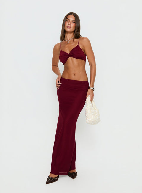   side view of model wearing Princess Polly Delores Ruched Maxi Skirt Red Maxi Skirts Skirts 