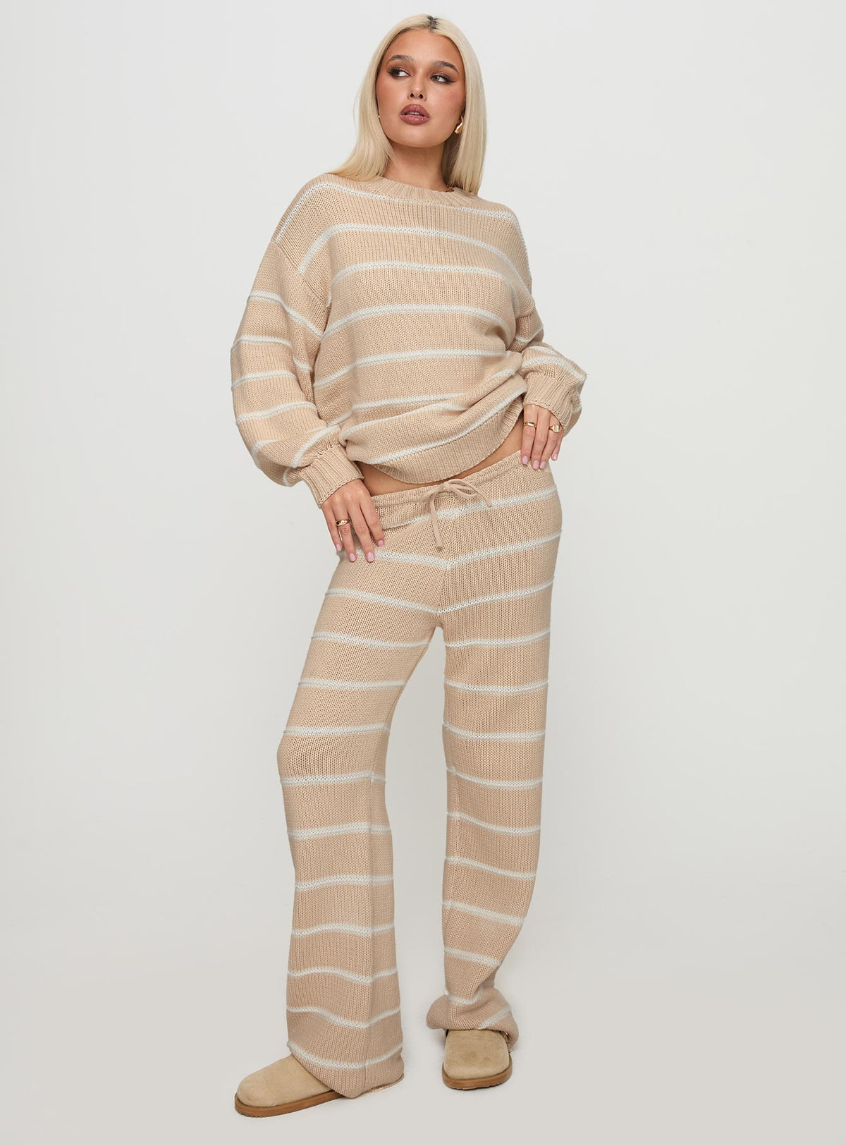 side view of model wearing Princess Polly Read Your Mind Knit Sweater Cream Stripe Jumpers 