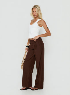 Crafted with the Two Lovers Low Rise Pants Chocolate in womens regular pants featuring belt and wide-leg cut side view of model wearing