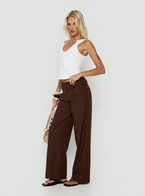Crafted with the Two Lovers Low Rise Pants Chocolate in womens regular pants featuring belt and wide-leg cut side view of model wearing