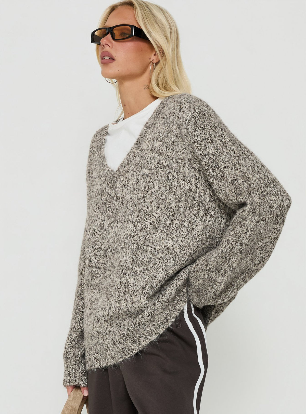 Crafted with the Ladiya V Neck Knit Sweater Brown Speckle womens-jumpers in long oversized fit side view of model wearing Princess Polly