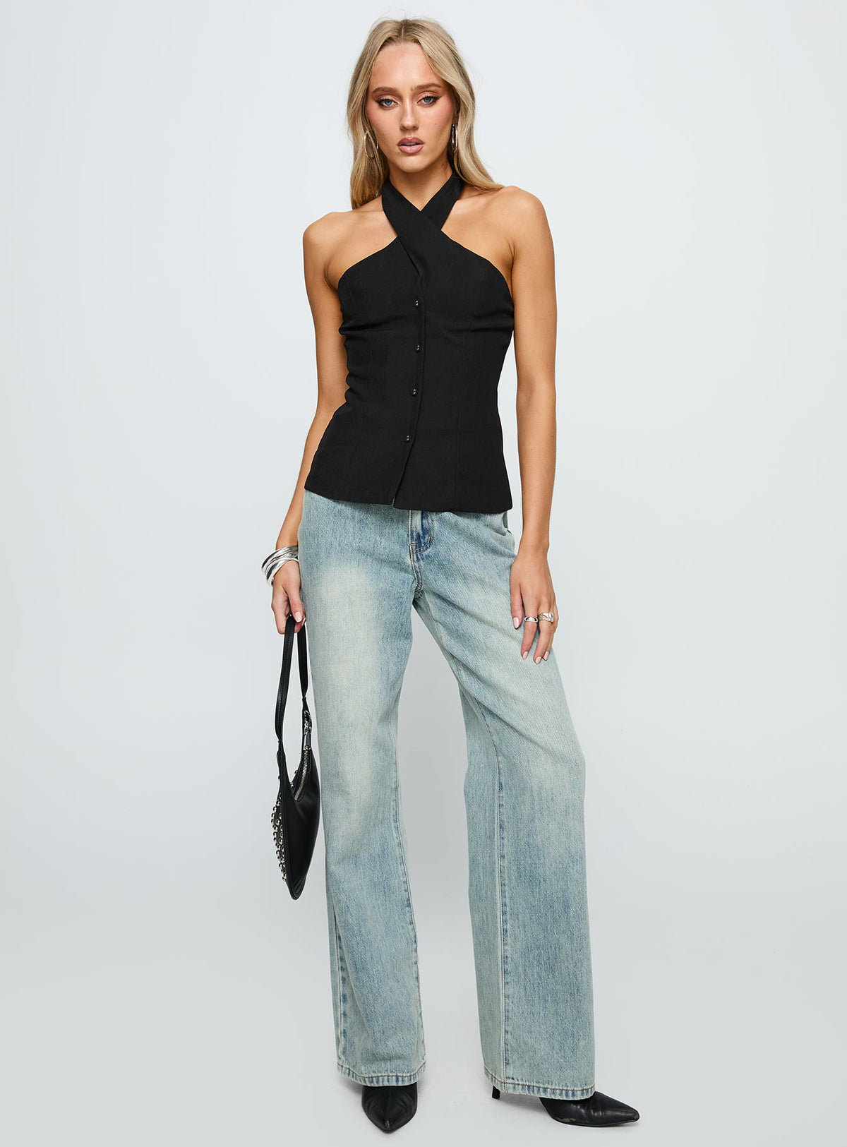 side view of model wearing Princess Polly Light Is Coming Cross Detail Top Black Sleeveless 