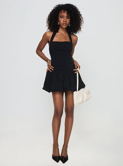 back view of model wearing Princess Polly Gigli Bubble Hem Mini Dress Black Petite Square Neck 