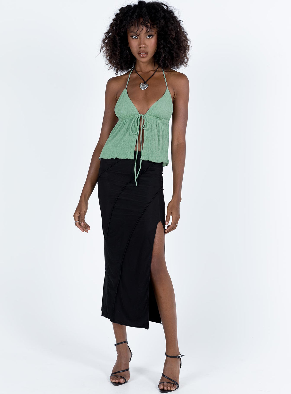 front view of model wearing Princess Polly Chantria Top Sage Lower Impact Sleeveless Plunger 