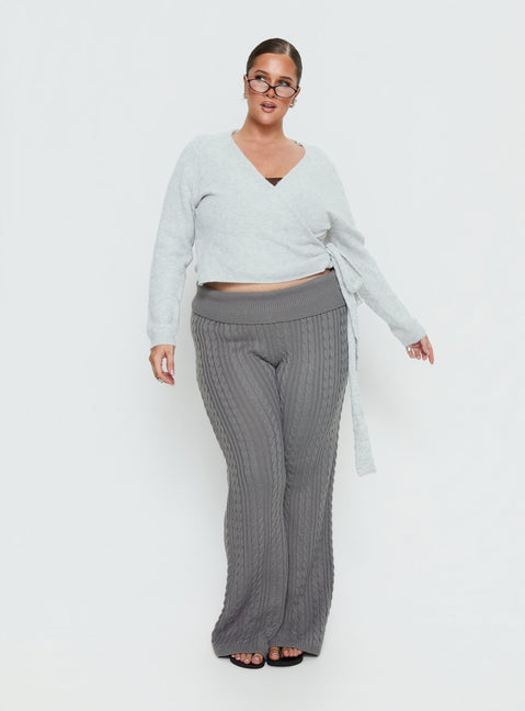 Crafted from soft knit the Tonee Wrap Cardigan Grey Curve in a short length womens jumper with v-neck and oversized fit on-body Princess Polly