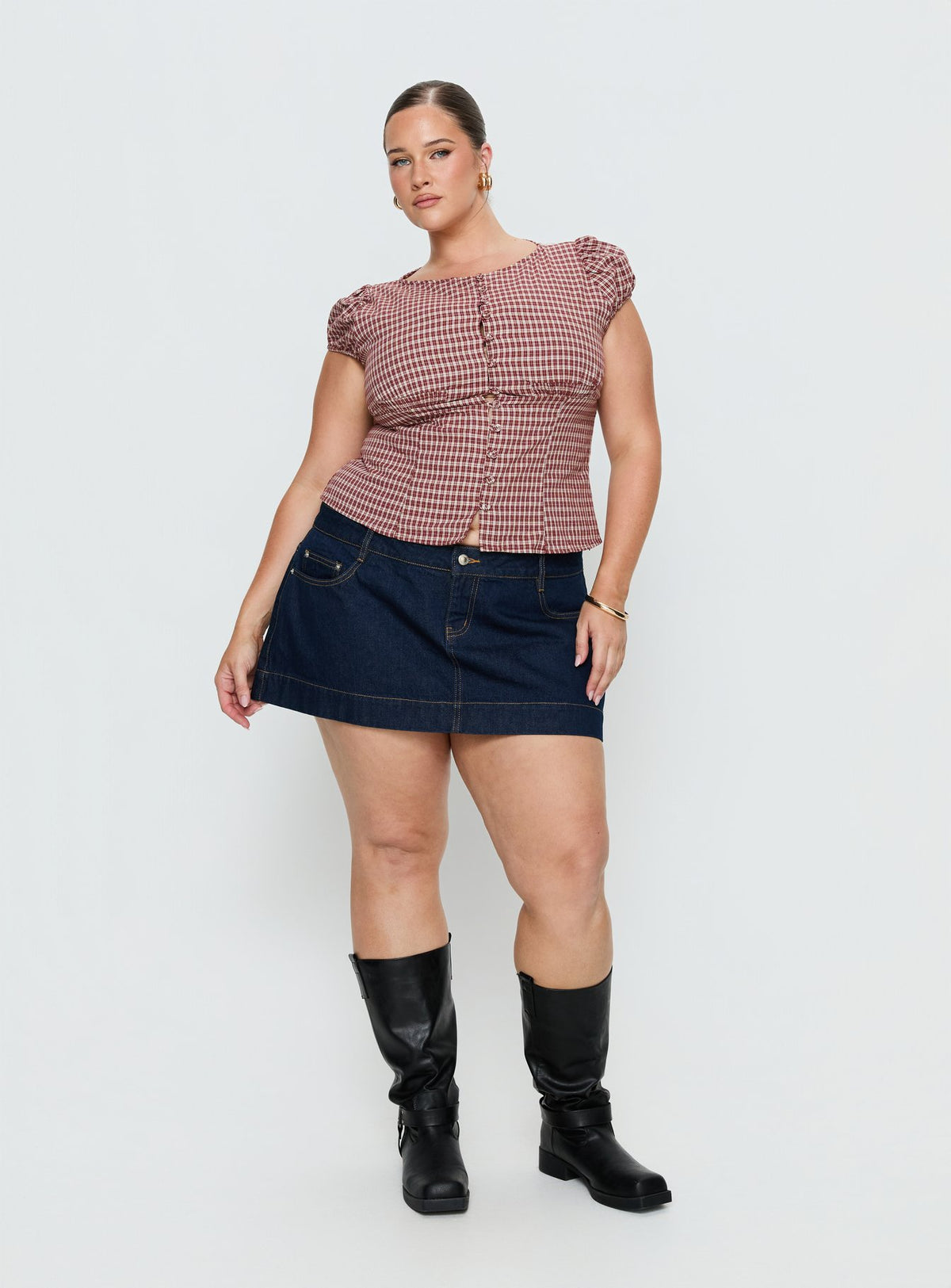 back view of model wearing Princess Polly Warna Low Rise Denim Mini Skirt Dark Wash Curve Mini Skirts Skirts 