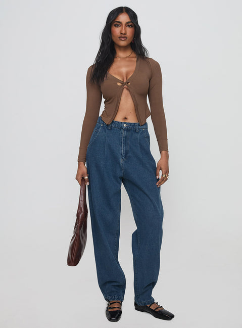 front view of model wearing Princess Polly Forestier Mid Rise Barrel Leg Pin Tuck Jeans Mid Blue High Rise Jeans Jeans 